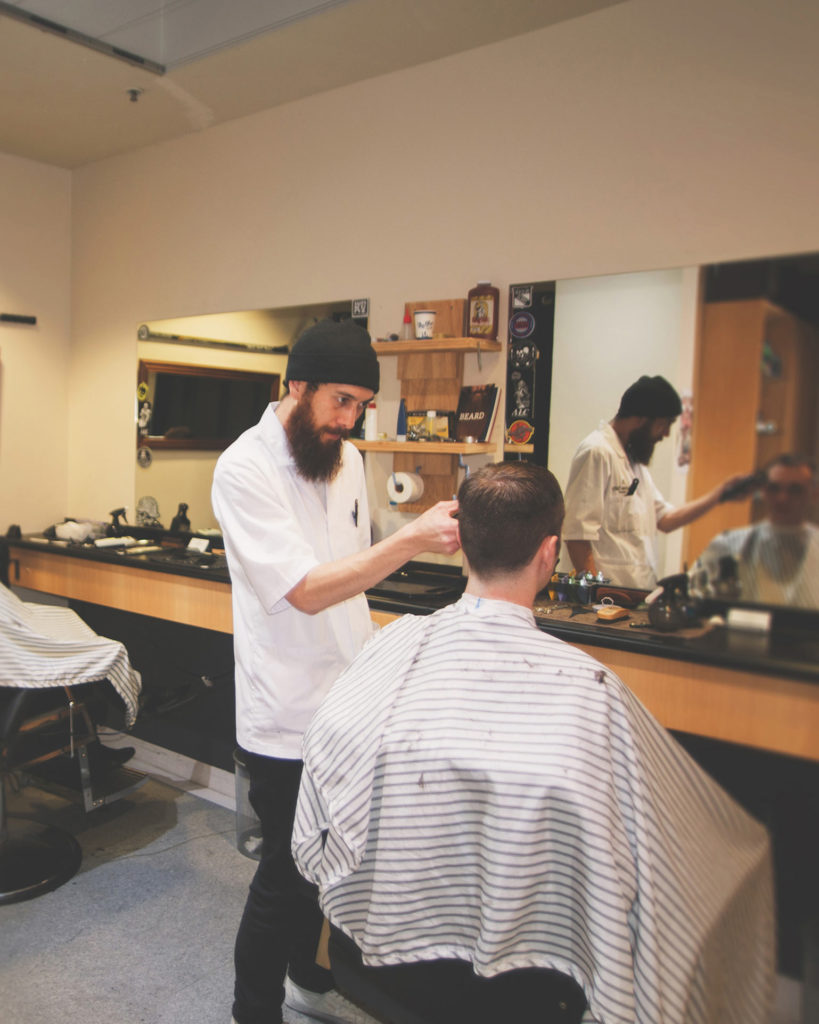 photo of customhouse quay wellington barbershop interior barber in action